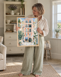 Lifestyle: living room — A whitewashed coastal cottage on the north Norfolk coast, Burnham Market — compact rooms, painted tongue-and-groove walls, deep windowsills overlooking a sea-garden, and a lived-in ease that suits a long weekend or a permanent retreat.