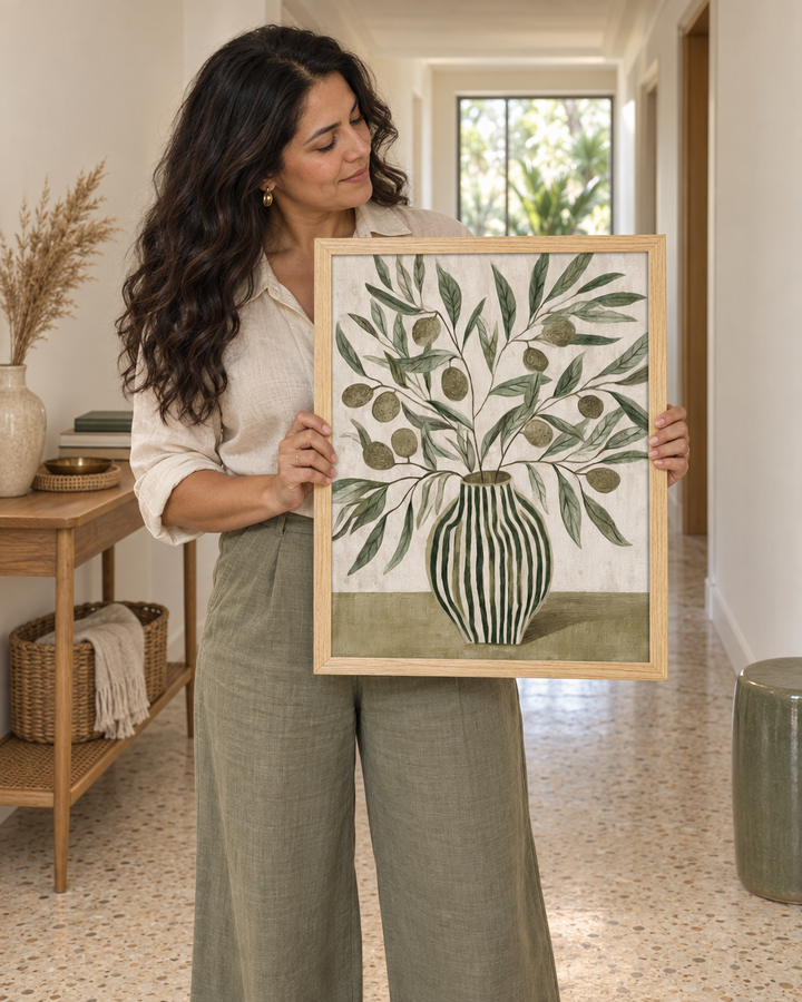 Lifestyle: Hallway — A single-storey 1960s ranch house in a Houston inner suburb, updated with care — walls in a warm white, original terrazzo in the entry, new oak cabinetry in the kitchen, and a general preference for natural materials over trend pieces.