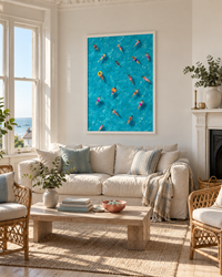 Lifestyle: living room — A wide-bay seaside Edwardian villa in Whitstable, high ceilings, original sash windows, painted floorboards and a relaxed coastal interior layered with rattan, linen and warm brass