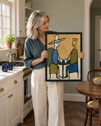 Lifestyle: kitchen — A DC Georgetown Federal rowhouse, narrow and tall, with original nine-pane kitchen windows, white-painted original cabinetry, and pale plaster walls; a home of quiet considered character.
