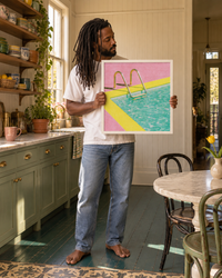 Lifestyle: kitchen — A narrow 1920s New Orleans shotgun house in the Bywater neighbourhood — high ceilings, painted timber floors, vintage patterned tile in the kitchen, and bold maximalist character throughout.