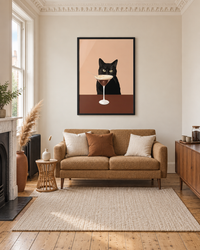 Lifestyle: living room — A Victorian terraced house in South London, original cornicing and picture rails intact, recently repainted throughout in soft neutrals, mid-century furniture mix.