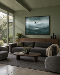 Lifestyle: living room — A 1960s Eichler post-and-beam in San Jose, California — open plan with an atrium courtyard, floor-to-ceiling glass, and a flat tongue-and-groove ceiling painted throughout in the same sage green.