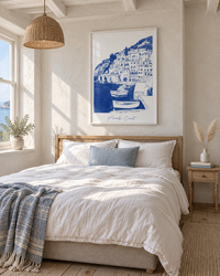 Lifestyle: bedroom — A whitewashed Cornish coastal cottage with deep windowsills, painted tongue-and-groove panelling and a gently salt-weathered character — the kind of home where every room quietly references the sea.