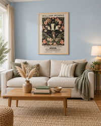 Lifestyle: living room — A 1970s split-level in suburban Connecticut, renovated by its current owners to blend original oak woodwork with English-country warmth and layered textiles.