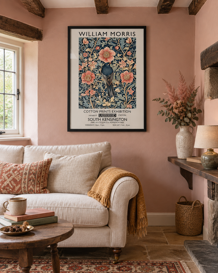 Lifestyle: living room — Thatched Dorset cottage, whitewashed cob walls, low beamed ceilings and small casement windows, warm and layered with antique textiles and heirloom ceramics