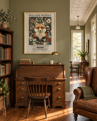 Lifestyle: home office / study — A New Orleans shotgun house in the Garden District — narrow rooms in sequence, high ceilings, original pine floors, a tall sash window at the far end throwing afternoon light through the length of the home.