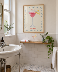 Lifestyle: bathroom — A lower-ground garden flat in a Kensington mews lane — compact, white-painted brick, with a light well that floods the bathroom in diffuse southern light.
